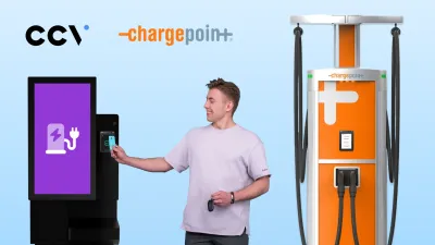 Guy paying at EV Charging station