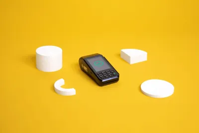 the mobile payment terminal CCV Mobile Premium on yellow background the mobile payment terminal CCV Mobile Premium on yellow background